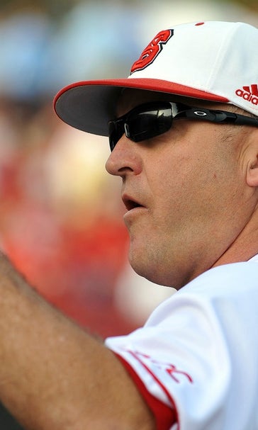 NC State's baseball coach and his puppy won a showdown with a snake